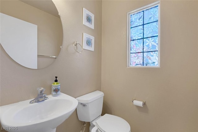 6217 Lapilli Ave, Las Vegas, NV 89139 - bathroom featuring a sink and toilet