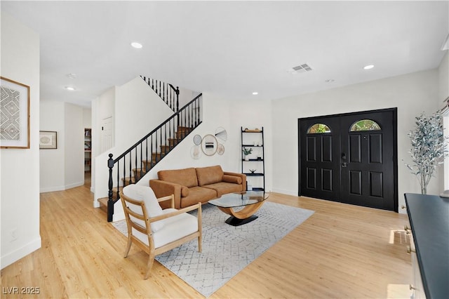 10645 Redwood Grove Ave, Las Vegas, NV 89144 - living area with stairs, light wood-style floors, and recessed lighting