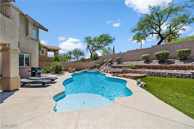 10645 Redwood Grove Ave, Las Vegas, NV 89144 - view of swimming pool featuring a fenced backyard, a patio area, a grill, and a pool with connected hot tub