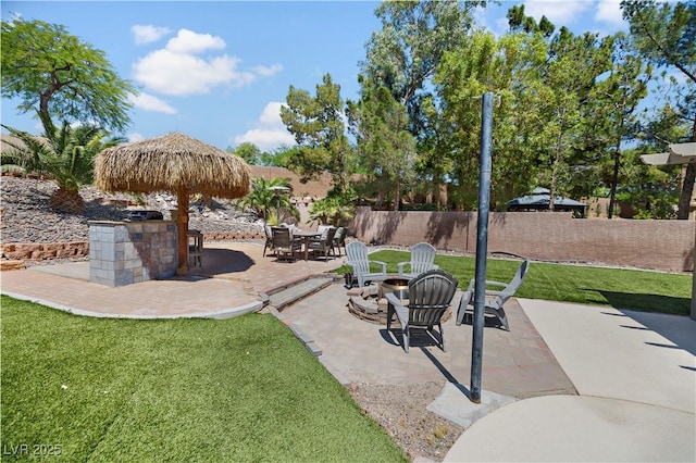 10645 Redwood Grove Ave, Las Vegas, NV 89144 - view of patio / terrace featuring an outdoor fire pit