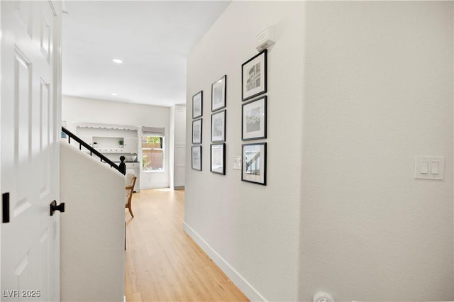 10645 Redwood Grove Ave, Las Vegas, NV 89144 - corridor with light wood-style floors, recessed lighting, and stairs