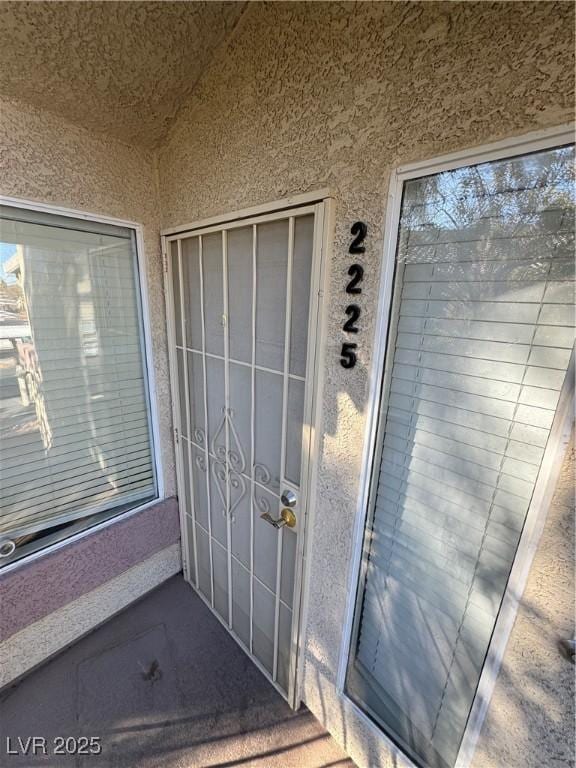 5710 E Tropicana Ave Unit 2225, Las Vegas, NV 89122 - view of exterior entry with stucco siding