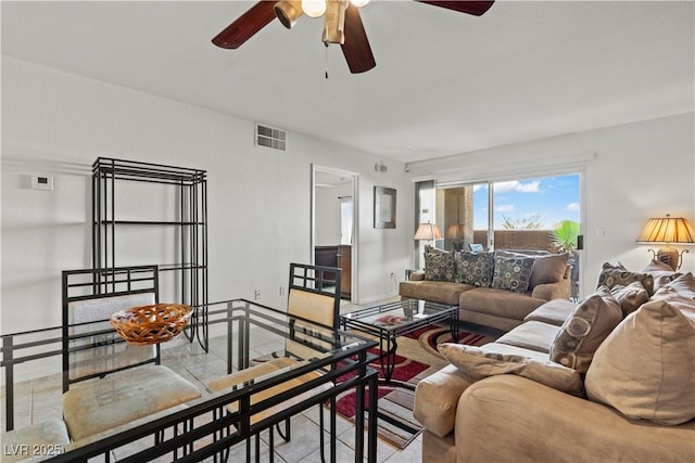 8070 W Russell Rd Unit 1023, Las Vegas, NV 89113 - living area featuring light tile patterned floors and ceiling fan