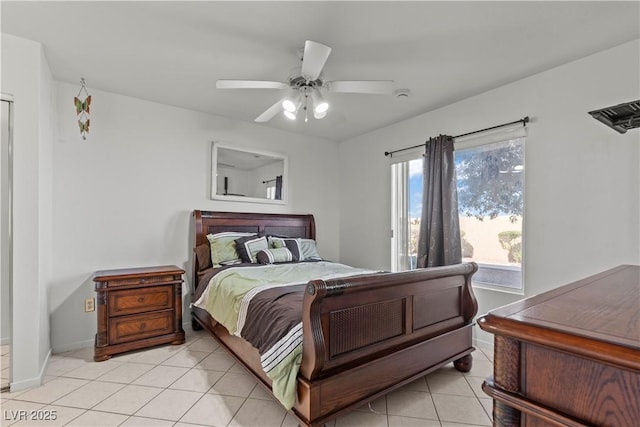 8070 W Russell Rd Unit 1023, Las Vegas, NV 89113 - bedroom featuring light tile patterned floors and a ceiling fan