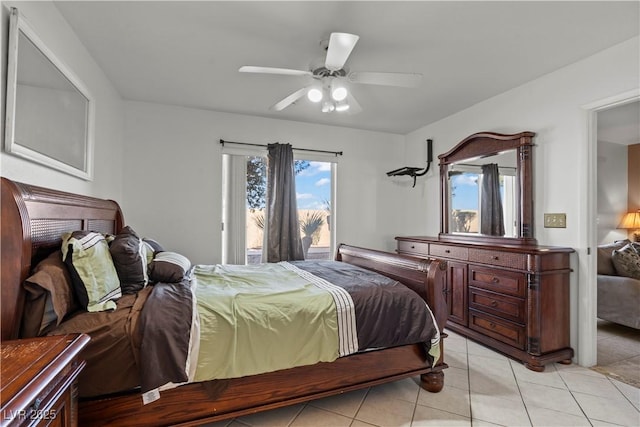 8070 W Russell Rd Unit 1023, Las Vegas, NV 89113 - bedroom featuring light tile patterned floors, ceiling fan, and access to exterior