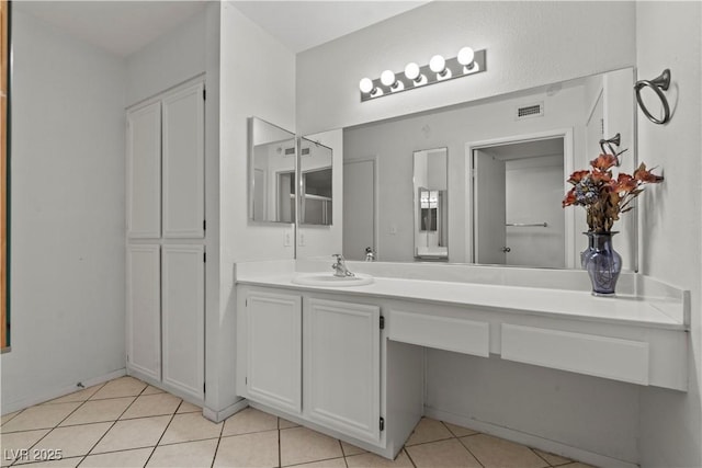 8070 W Russell Rd Unit 1023, Las Vegas, NV 89113 - bathroom with vanity and tile patterned floors