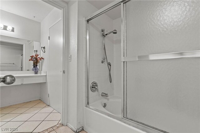 8070 W Russell Rd Unit 1023, Las Vegas, NV 89113 - full bathroom featuring shower / bath combination with glass door and tile patterned floors