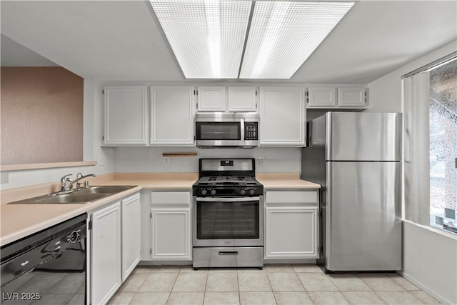 8070 W Russell Rd Unit 1023, Las Vegas, NV 89113 - kitchen with appliances with stainless steel finishes, light countertops, and light tile patterned floors