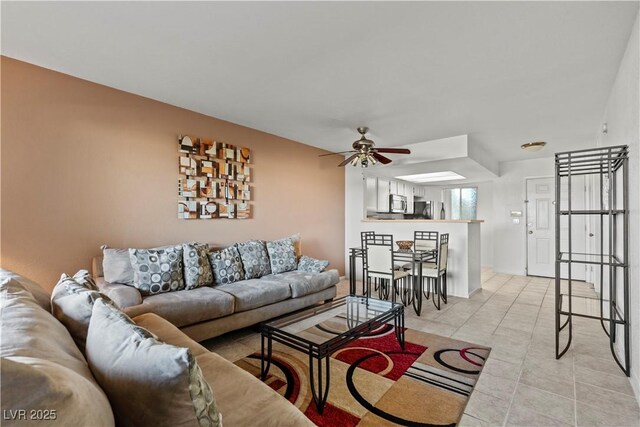 8070 W Russell Rd Unit 1023, Las Vegas, NV 89113 - living area with a ceiling fan and light tile patterned floors