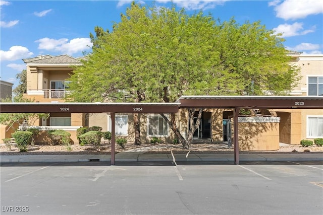 8070 W Russell Rd Unit 1023, Las Vegas, NV 89113 - view of property featuring covered parking