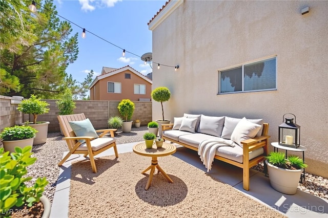 9011 Aldershot Ct, Las Vegas, NV 89147 - fenced backyard with a patio and outdoor lounge area