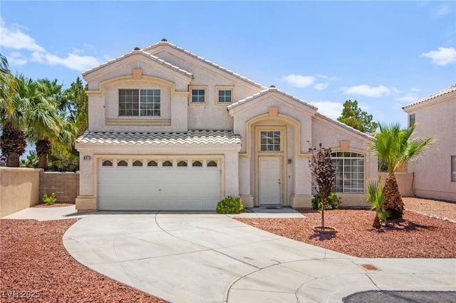 9011 Aldershot Ct, Las Vegas, NV 89147 - mediterranean / spanish-style home featuring a tiled roof, concrete driveway, stucco siding, and a garage