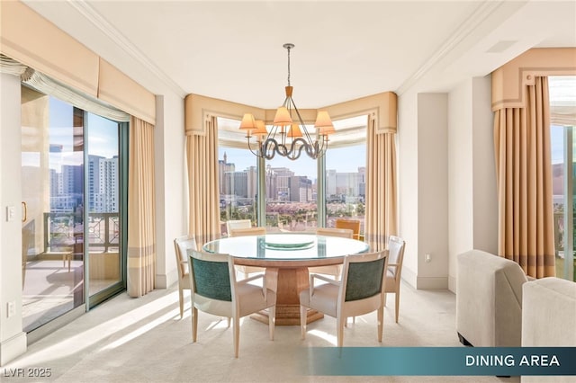 1 Hughes Center Dr Unit 903, Las Vegas, NV 89169 - dining room with a chandelier, a skyline view, light carpet, and ornamental molding