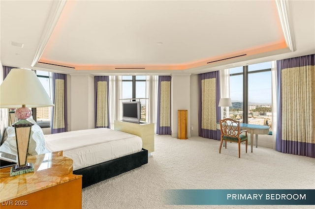 1 Hughes Center Dr Unit 903, Las Vegas, NV 89169 - bedroom with a raised ceiling, carpet, and a wall of windows
