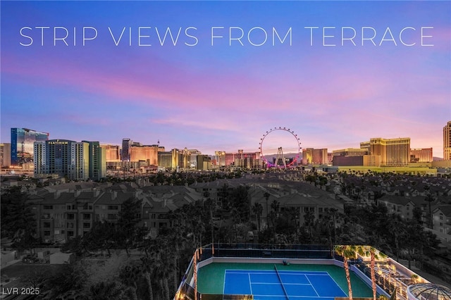 1 Hughes Center Dr Unit 903, Las Vegas, NV 89169 - pool at dusk featuring a view of city and a tennis court