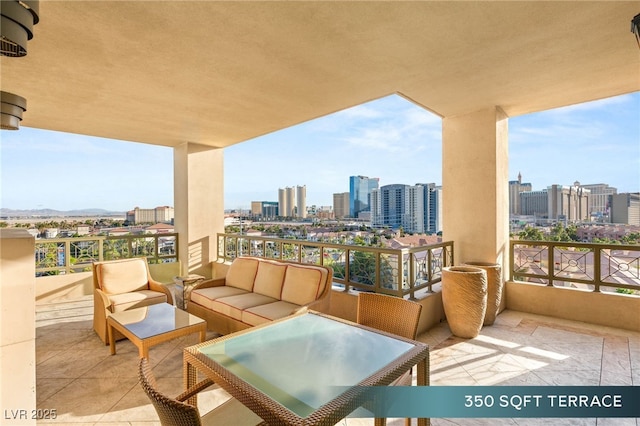 1 Hughes Center Dr Unit 903, Las Vegas, NV 89169 - balcony featuring a skyline view and an outdoor hangout area