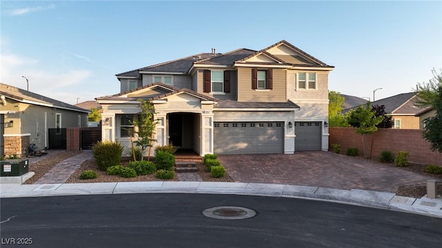 2913 Monate Ct, Henderson, NV 89044 - view of front of house with decorative driveway and an attached garage