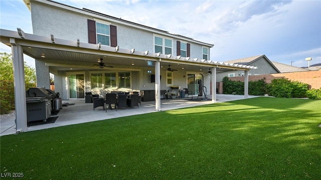 2913 Monate Ct, Henderson, NV 89044 - back of house with a ceiling fan, a patio area, and stucco siding