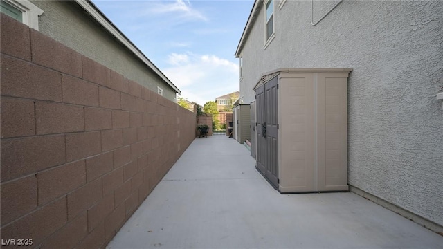 2913 Monate Ct, Henderson, NV 89044 - view of home's exterior with stucco siding and a patio area