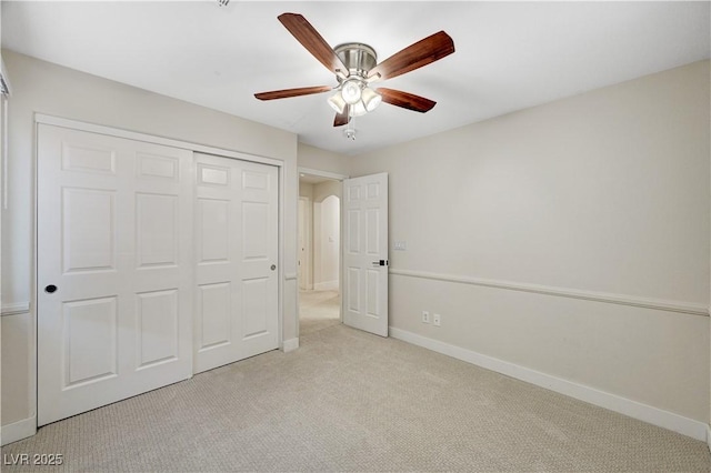 9021 Rendon St, Las Vegas, NV 89143 - unfurnished bedroom featuring light colored carpet, a closet, and ceiling fan