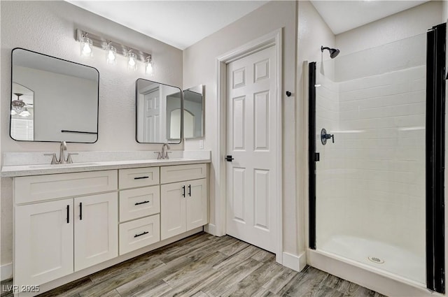 9021 Rendon St, Las Vegas, NV 89143 - full bath with a stall shower, double vanity, and wood finished floors