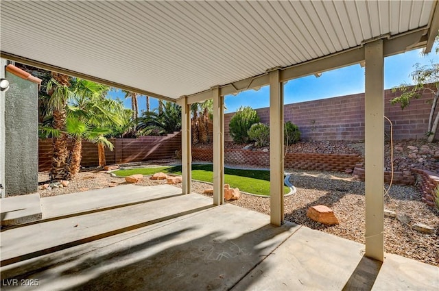 9021 Rendon St, Las Vegas, NV 89143 - fenced backyard with a patio area