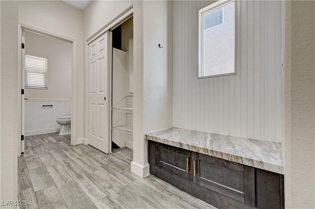 9021 Rendon St, Las Vegas, NV 89143 - mudroom with a wainscoted wall and light wood-type flooring