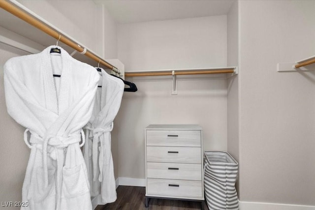 8353 Lower Trailhead Ave, Las Vegas, NV 89113 - spacious closet featuring dark wood-style floors