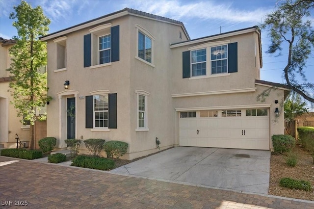 8353 Lower Trailhead Ave, Las Vegas, NV 89113 - multi unit property with stucco siding, driveway, and a garage