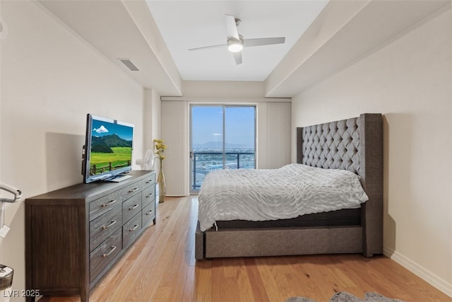 8255 Las Vegas Blvd Unit 1905, Las Vegas, NV 89123 - bedroom with access to exterior, light wood-style flooring, and ceiling fan