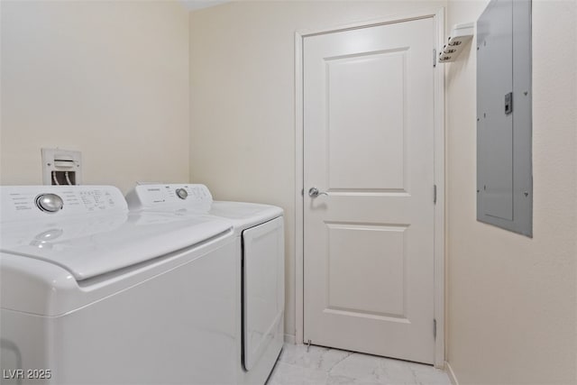 8255 Las Vegas Blvd Unit 1905, Las Vegas, NV 89123 - laundry room featuring washer and clothes dryer, electric panel, and light marble finish flooring