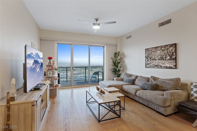 8255 Las Vegas Blvd Unit 1905, Las Vegas, NV 89123 - living room with light wood finished floors and a ceiling fan