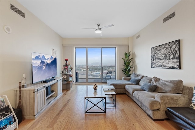 8255 Las Vegas Blvd Unit 1905, Las Vegas, NV 89123 - living area featuring light wood-style floors and ceiling fan