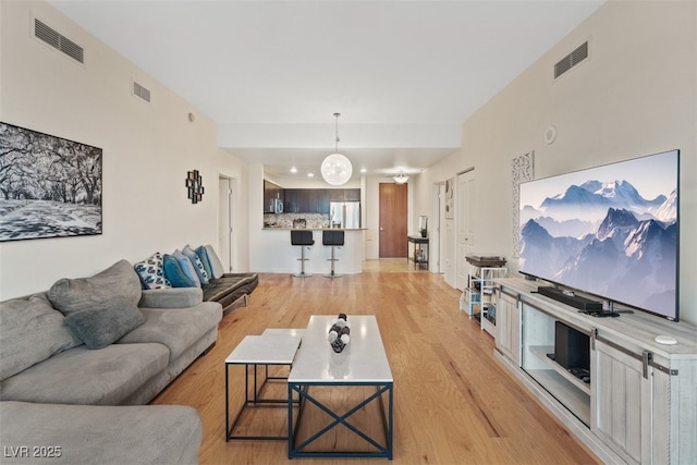 8255 Las Vegas Blvd Unit 1905, Las Vegas, NV 89123 - living room featuring light wood finished floors