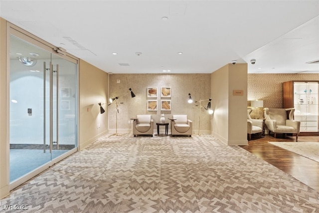 8255 Las Vegas Blvd Unit 1905, Las Vegas, NV 89123 - living area featuring wallpapered walls and wood finished floors