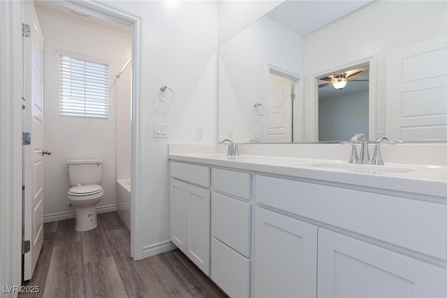 835 Aurelie Ridge St, Henderson, NV 89011 - full bath with double vanity, wood finished floors, shower / bathtub combination, and ceiling fan