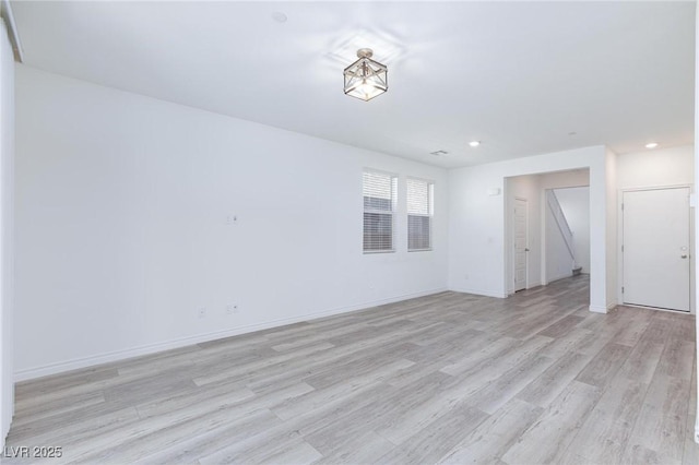 835 Aurelie Ridge St, Henderson, NV 89011 - spare room featuring light wood-style flooring and recessed lighting