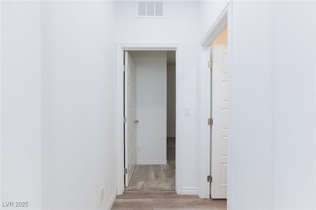 835 Aurelie Ridge St, Henderson, NV 89011 - hall featuring light wood-style flooring and baseboards