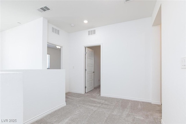835 Aurelie Ridge St, Henderson, NV 89011 - empty room with light colored carpet and recessed lighting