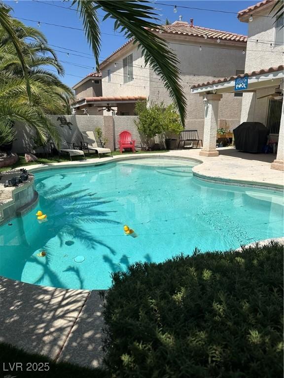 10265 Moth Orchid Ct, Las Vegas, NV 89183 - view of pool featuring area for grilling and a patio area