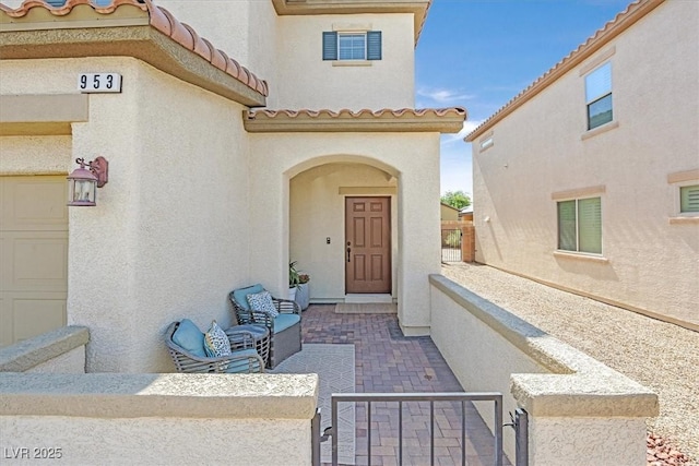 953 Via Del Tramonto St, Henderson, NV 89011 - entrance to property featuring stucco siding and a tile roof