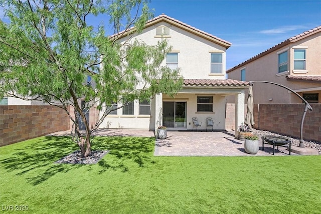 953 Via Del Tramonto St, Henderson, NV 89011 - rear view of property with stucco siding, a tiled roof, and a patio area