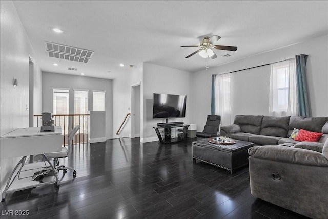 10300 S Dapple Gray Rd, Las Vegas, NV 89178 - living area with wood finished floors, a ceiling fan, and a desk
