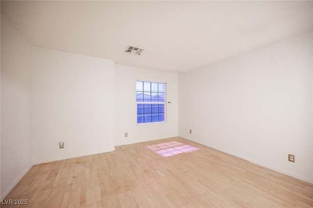 10414 Midseason Mist St, Las Vegas, NV 89183 - empty room with light wood finished floors and baseboards