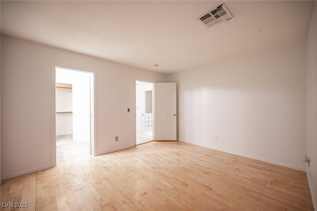 10414 Midseason Mist St, Las Vegas, NV 89183 - empty room with light wood finished floors and baseboards