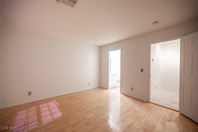 10414 Midseason Mist St, Las Vegas, NV 89183 - unfurnished room with light wood-type flooring and a smoke detector