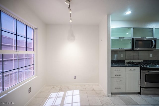 10414 Midseason Mist St, Las Vegas, NV 89183 - kitchen featuring appliances with stainless steel finishes, healthy amount of natural light, and recessed lighting