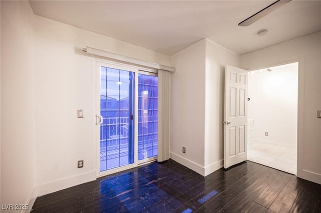 10414 Midseason Mist St, Las Vegas, NV 89183 - unfurnished room with dark wood-type flooring and baseboards