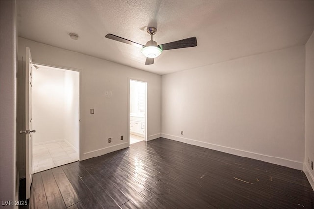 10414 Midseason Mist St, Las Vegas, NV 89183 - empty room featuring ceiling fan, a textured ceiling, dark wood finished floors, and a smoke detector