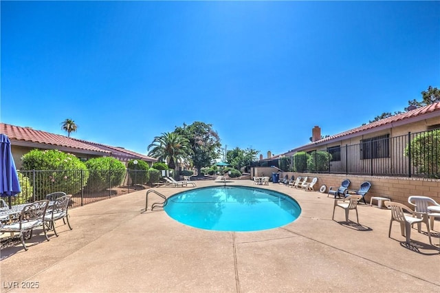 1857 Arbol Verde Way, Las Vegas, NV 89119 - community pool featuring a patio area